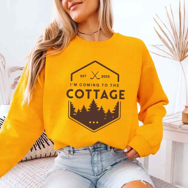 May include I'm Coming To The Cottage crewneck sweatshirt with reader-inspired graphic and cozy unisex fleece fit