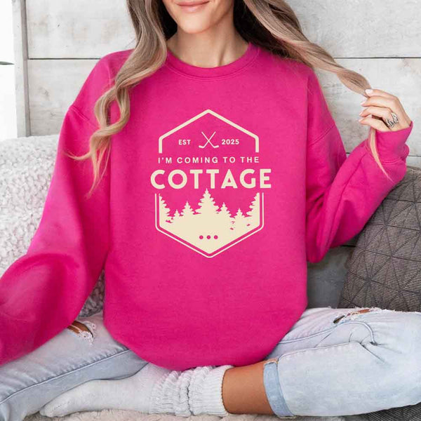 May include I'm Coming To The Cottage crewneck sweatshirt with reader-inspired graphic and cozy unisex fleece fit