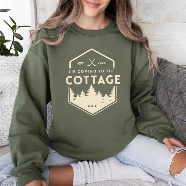 May include I'm Coming To The Cottage crewneck sweatshirt with reader-inspired graphic and cozy unisex fleece fit