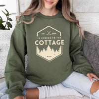 May include I'm Coming To The Cottage crewneck sweatshirt with reader-inspired graphic and cozy unisex fleece fit