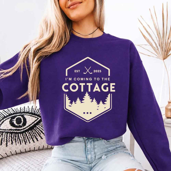 May include I'm Coming To The Cottage crewneck sweatshirt with reader-inspired graphic and cozy unisex fleece fit