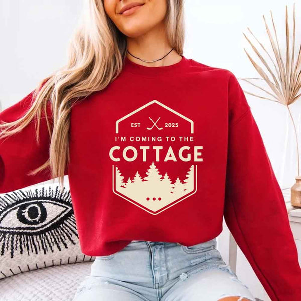 May include I'm Coming To The Cottage crewneck sweatshirt with reader-inspired graphic and cozy unisex fleece fit