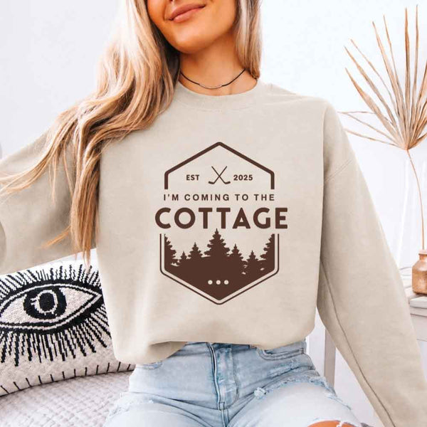 May include I'm Coming To The Cottage crewneck sweatshirt with reader-inspired graphic and cozy unisex fleece fit