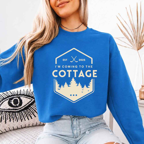 May include I'm Coming To The Cottage crewneck sweatshirt with reader-inspired graphic and cozy unisex fleece fit