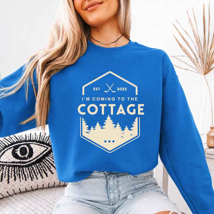 May include I'm Coming To The Cottage crewneck sweatshirt with reader-inspired graphic and cozy unisex fleece fit