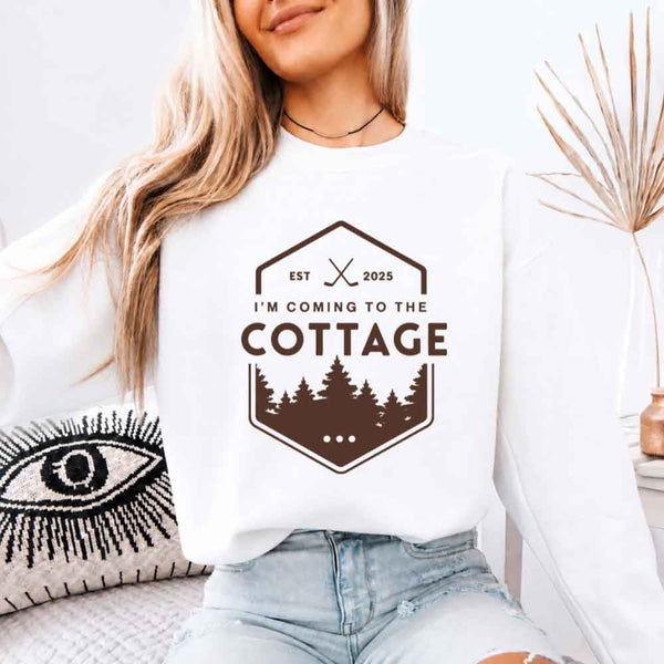 May include I'm Coming To The Cottage crewneck sweatshirt with reader-inspired graphic and cozy unisex fleece fit