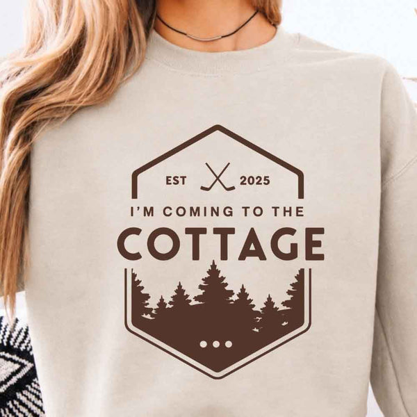 May include I'm Coming To The Cottage crewneck sweatshirt with reader-inspired graphic and cozy unisex fleece fit