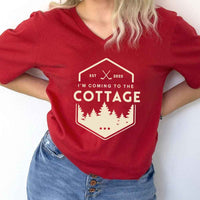 May include I'm Coming to the Cottage v-neck tee with hockey romance BookTok graphic and relaxed unisex fit