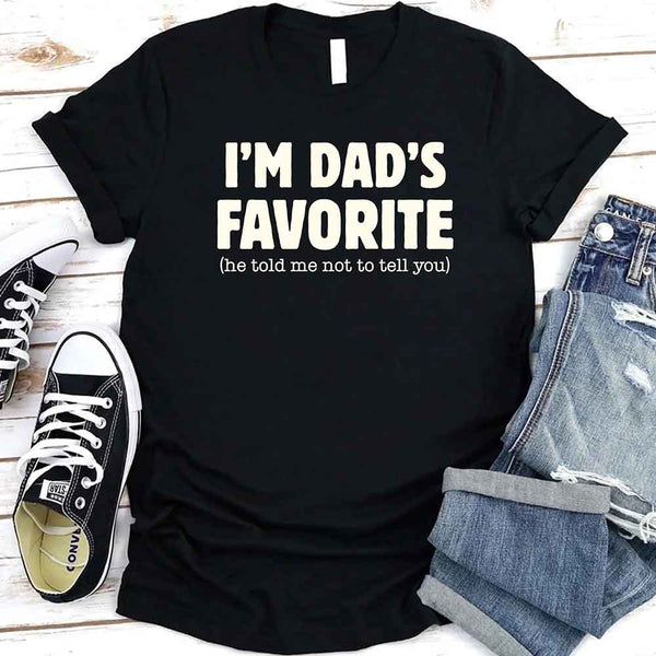 May include a unisex T-shirt with the phrase I’m Dad’s Favorite printed in a bold, humorous style.
