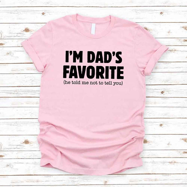 May include a unisex T-shirt with the phrase I’m Dad’s Favorite printed in a bold, humorous style.