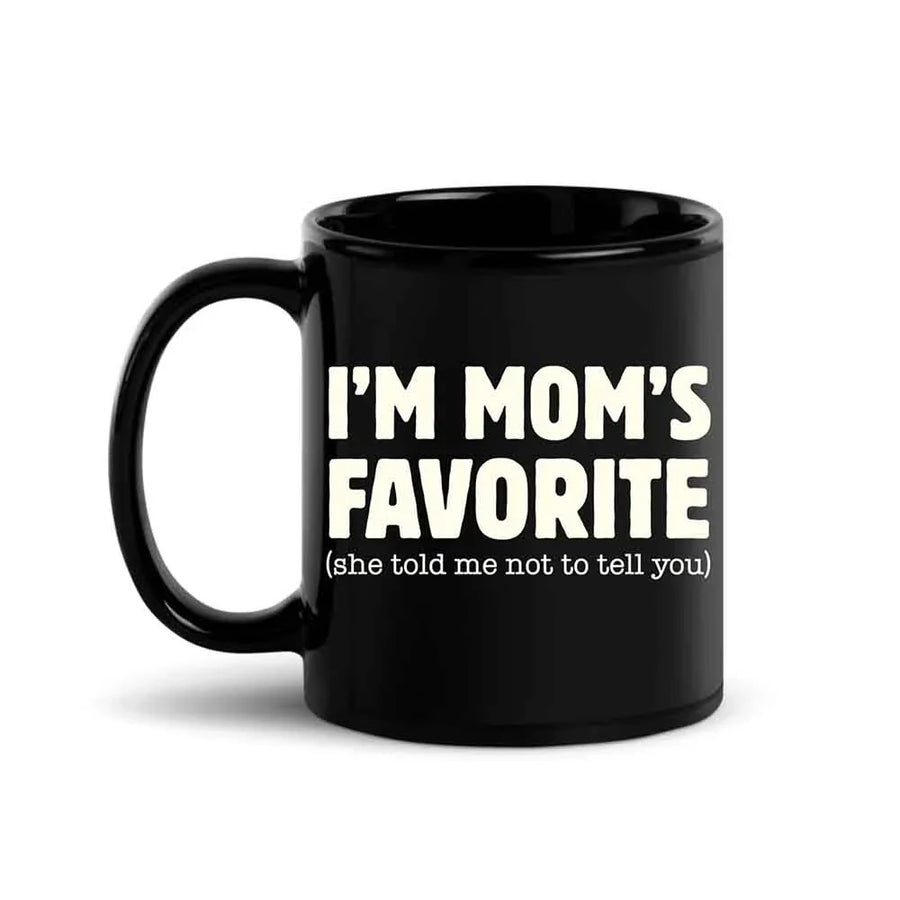 May include a ceramic coffee mug featuring the humorous phrase “I’m Mom’s Favorite” suitable for sons, daughters, and gifting.
