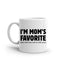 May include a ceramic coffee mug featuring the humorous phrase “I’m Mom’s Favorite” suitable for sons, daughters, and gifting.