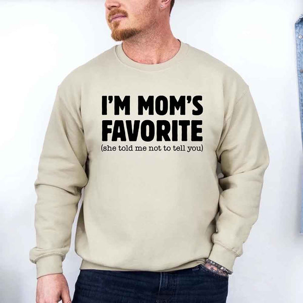 May include a unisex crewneck sweatshirt with the phrase I’m Mom’s Favorite printed clearly on the front.