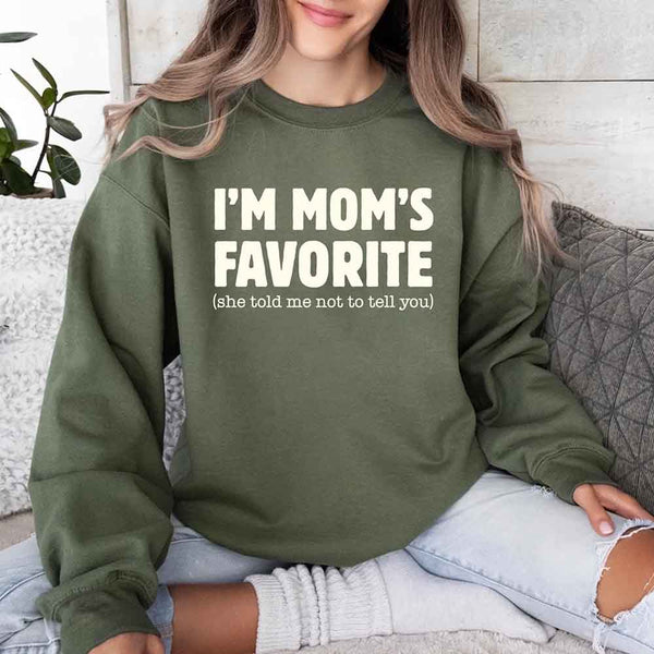 May include a unisex crewneck sweatshirt with the phrase I’m Mom’s Favorite printed clearly on the front.