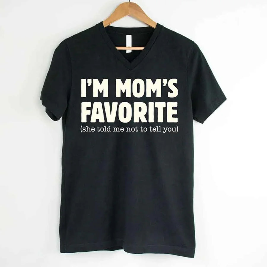 May include a V-neck shirt displaying a bold humorous message claiming to be Mom’s favorite.