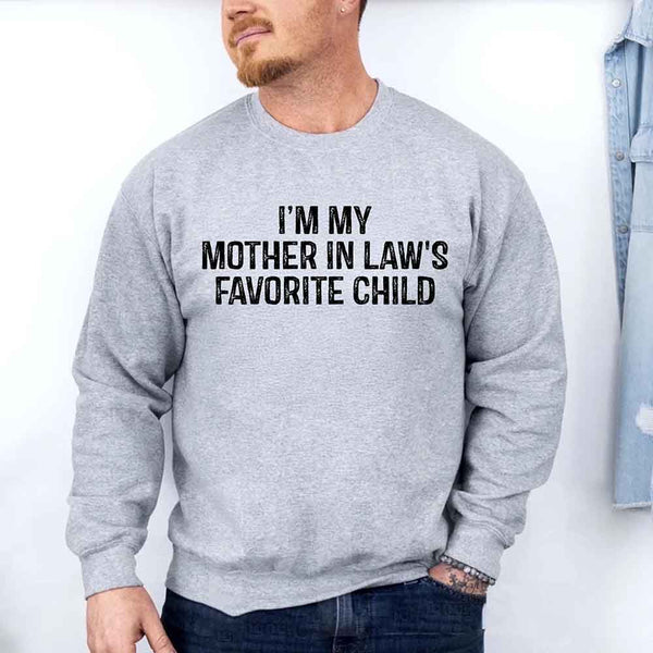 May include a crewneck sweatshirt with the phrase I’m My Mother-In-Law’s Favorite Child printed on the front.