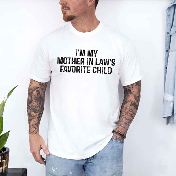 May include a unisex t-shirt printed with the phrase “I’m My Mother-In-Law’s Favorite Child” in a humorous family design.
