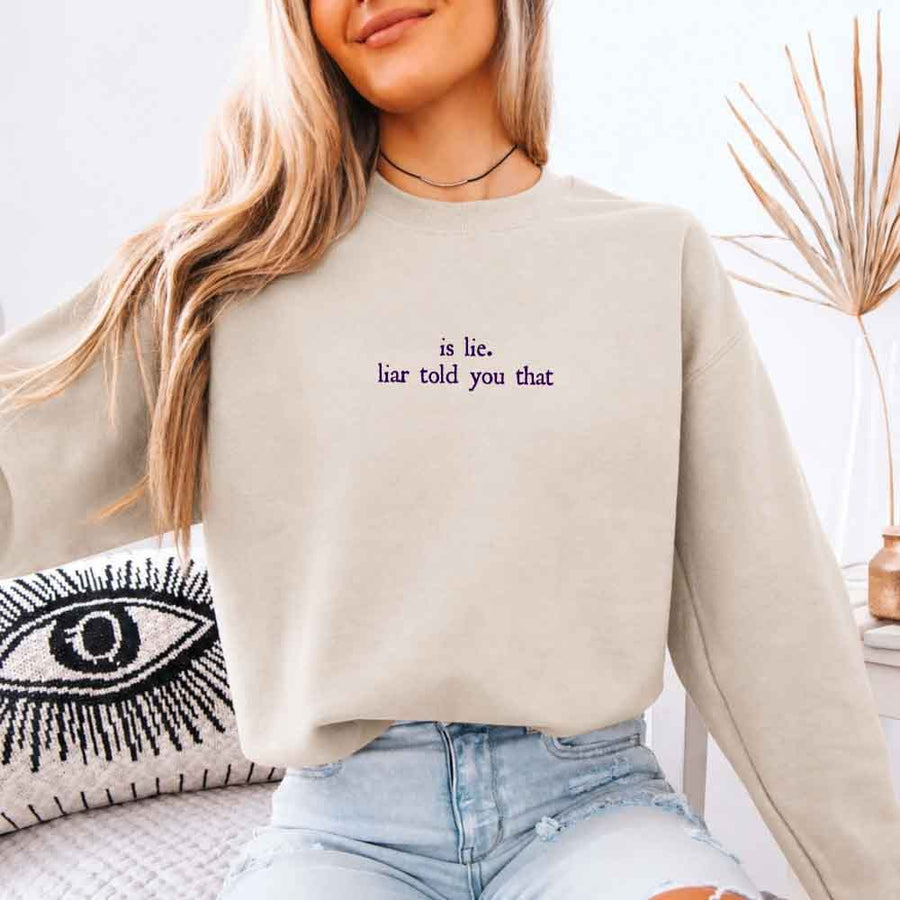 May include Is Liar Liar Told You That crewneck sweatshirt with relaxed fit rivalry inspired graphic design