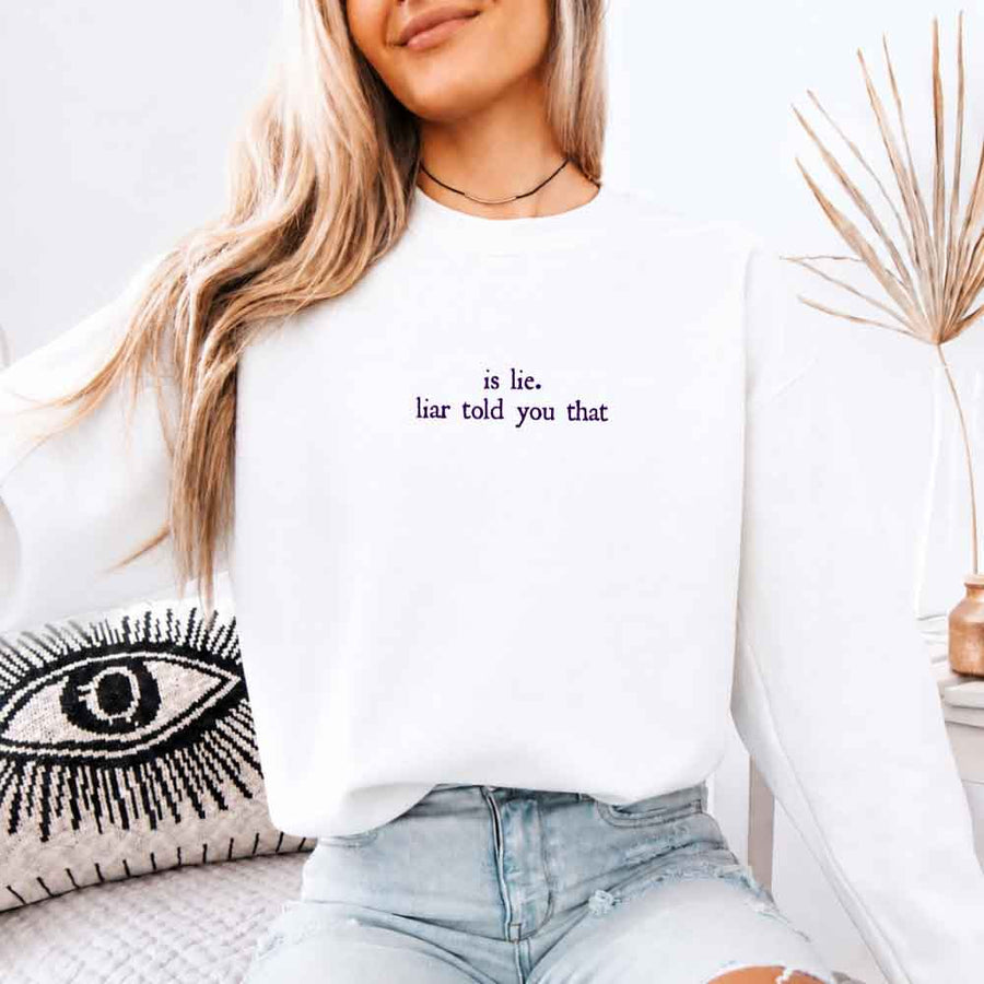May include Is Liar Liar Told You That crewneck sweatshirt with relaxed fit rivalry inspired graphic design