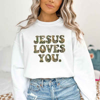 May include Jesus Loves You camouflage sweatshirt with Christian faith graphic design and relaxed unisex fit