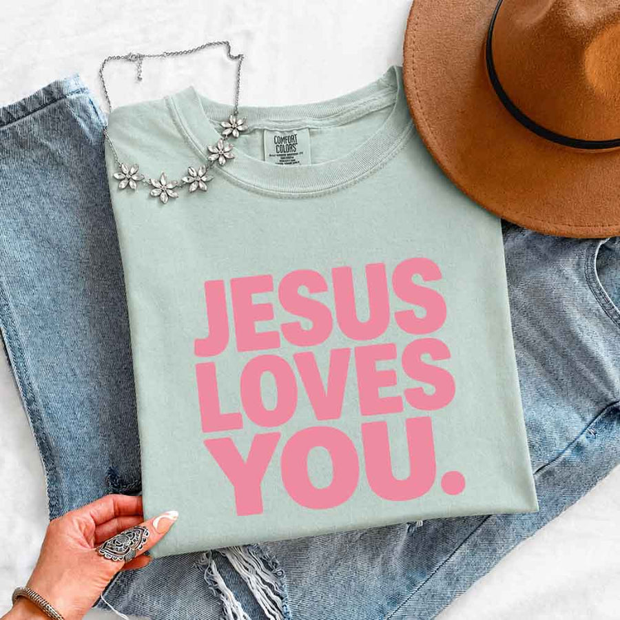 May include Jesus Loves You Comfort Colors short sleeve religious message shirt with relaxed fit graphic design