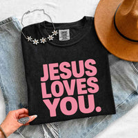May include Jesus Loves You Comfort Colors short sleeve religious message shirt with relaxed fit graphic design