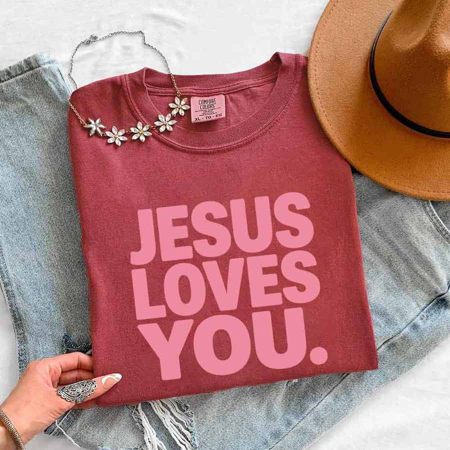 May include Jesus Loves You Comfort Colors short sleeve religious message shirt with relaxed fit graphic design