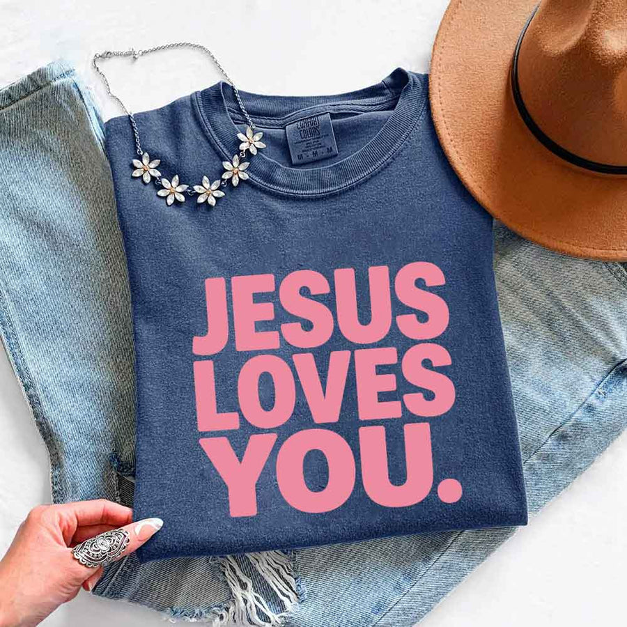 May include Jesus Loves You Comfort Colors short sleeve religious message shirt with relaxed fit graphic design