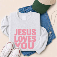 May include Jesus Loves You sweatshirt with relaxed fit religious message graphic design and cozy fabric
