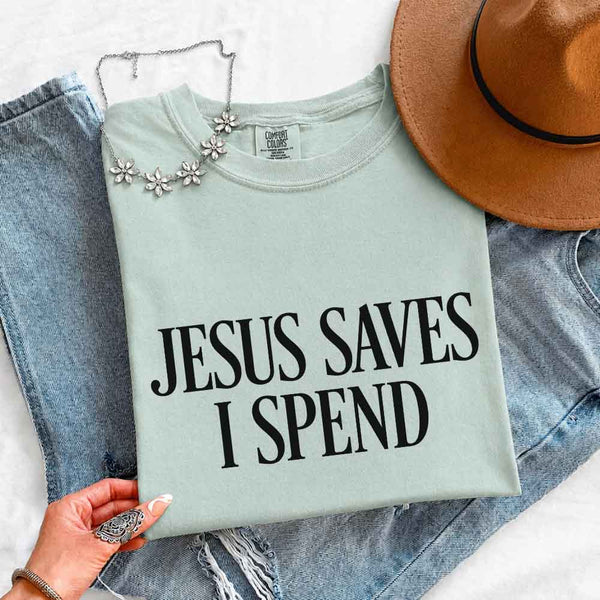 May include Jesus Saves I Spend Comfort Colors short sleeve tee with gospel inspired humor graphic design