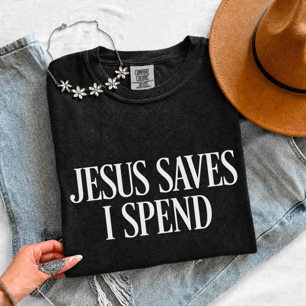 May include Jesus Saves I Spend Comfort Colors short sleeve tee with gospel inspired humor graphic design