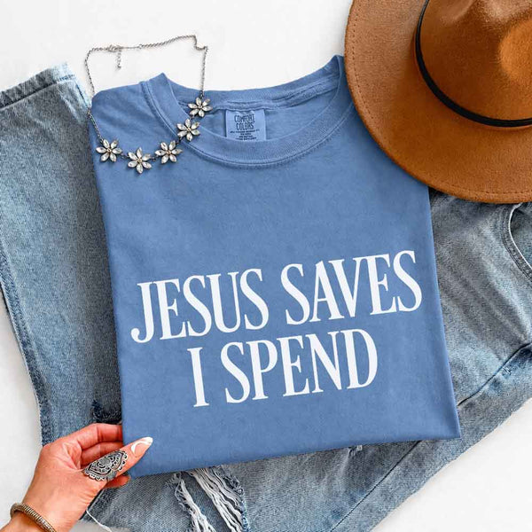 May include Jesus Saves I Spend Comfort Colors short sleeve tee with gospel inspired humor graphic design