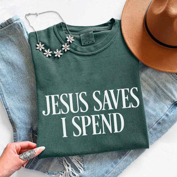 May include Jesus Saves I Spend Comfort Colors short sleeve tee with gospel inspired humor graphic design