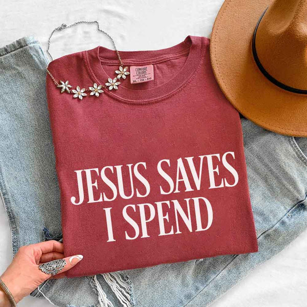 May include Jesus Saves I Spend Comfort Colors short sleeve tee with gospel inspired humor graphic design