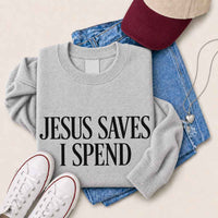 May include Jesus Saves I Spend sweatshirt with gospel inspired humor graphic design and relaxed unisex fit