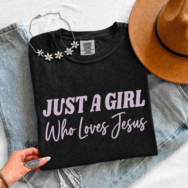 May include Just A Girl Who Loves Jesus Comfort Colors women’s faith graphic tee with relaxed fit design