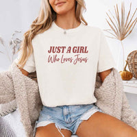 May include Just A Girl Who Loves Jesus Comfort Colors women’s faith graphic tee with relaxed fit design