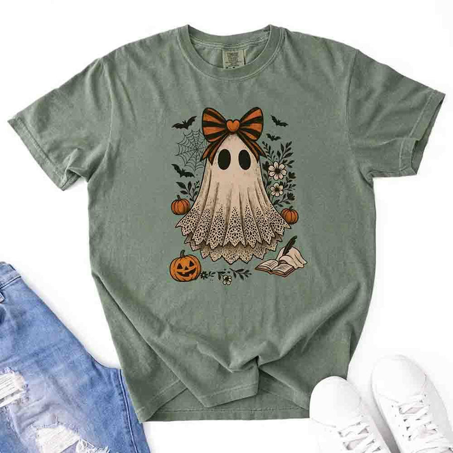 May include lace ghost Halloween graphic with black eyes, orange striped bow, pumpkins, spider web, bats, flowers, and open spell book – spooky vintage shirt design.
