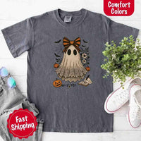 May include lace ghost Halloween graphic with black eyes, orange striped bow, pumpkins, spider web, bats, flowers, and open spell book – spooky vintage shirt design.