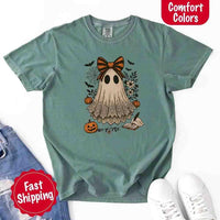 May include lace ghost Halloween graphic with black eyes, orange striped bow, pumpkins, spider web, bats, flowers, and open spell book – spooky vintage shirt design.