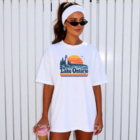 May include a Lake Ontario Comfort Colors T-Shirt featuring a lakeside-inspired graphic design for casual everyday wear.