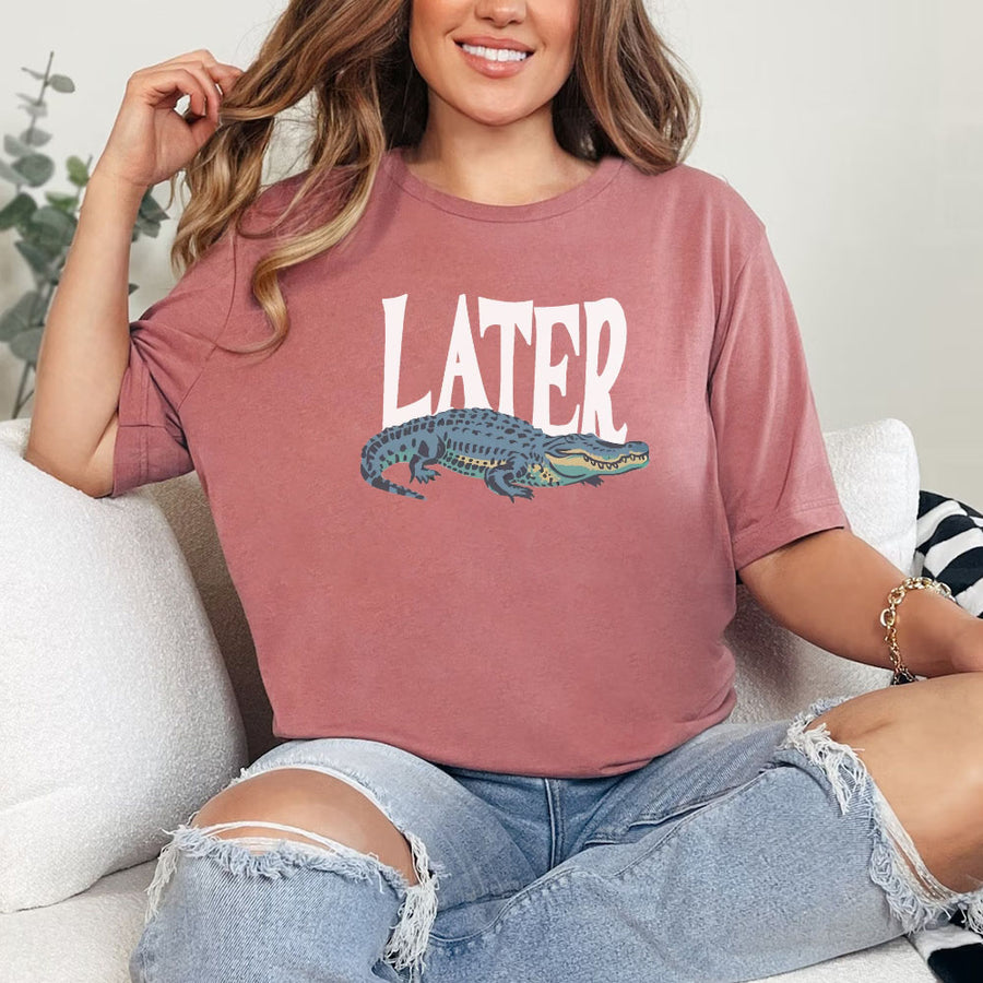 May include Later Gator Vintage 90s unisex t-shirt with retro alligator graphic, classic crew neck, and soft cotton fabric