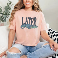 May include Later Gator Vintage 90s unisex t-shirt with retro alligator graphic, classic crew neck, and soft cotton fabric