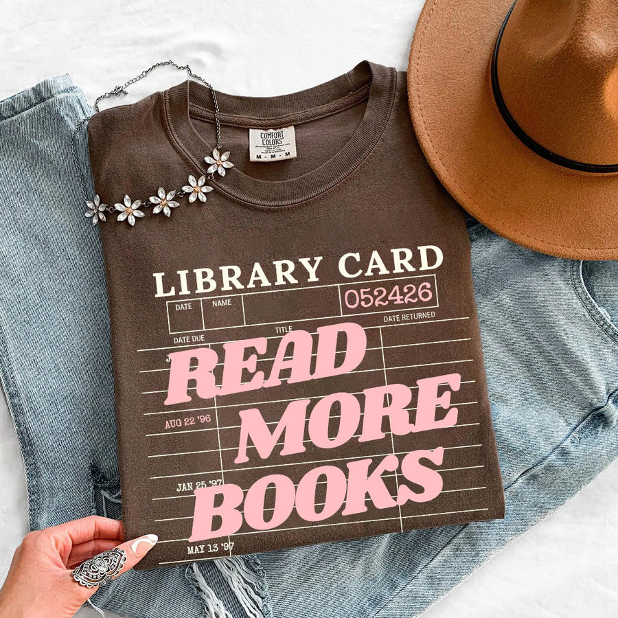 May include Library Card Comfort Colors unisex t-shirt with bookish graphic, relaxed fit, and soft garment-dyed cotton