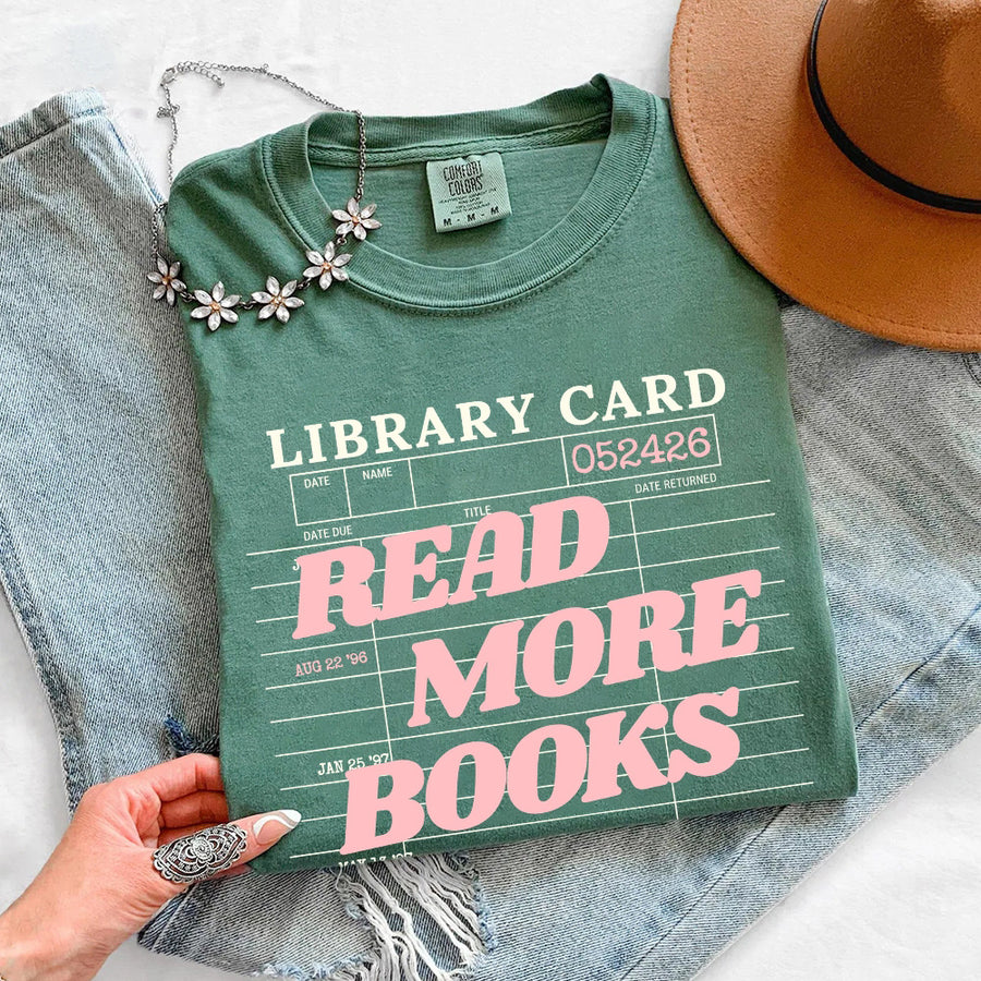 May include Library Card Comfort Colors unisex t-shirt with bookish graphic, relaxed fit, and soft garment-dyed cotton
