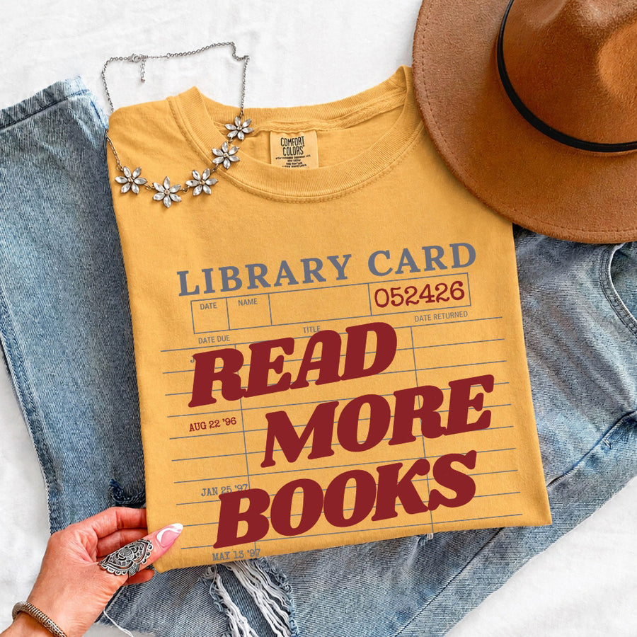 May include Library Card Comfort Colors unisex t-shirt with bookish graphic, relaxed fit, and soft garment-dyed cotton