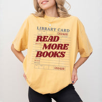 May include Library Card Comfort Colors unisex t-shirt with bookish graphic, relaxed fit, and soft garment-dyed cotton