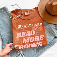 May include Library Card Comfort Colors unisex t-shirt with bookish graphic, relaxed fit, and soft garment-dyed cotton