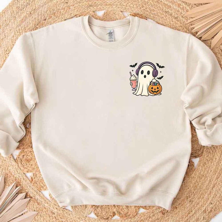 May include cute ghost wearing headphones, holding a milkshake and jack-o’-lantern candy bucket, with flying bats – fun kawaii Halloween graphic tee design.