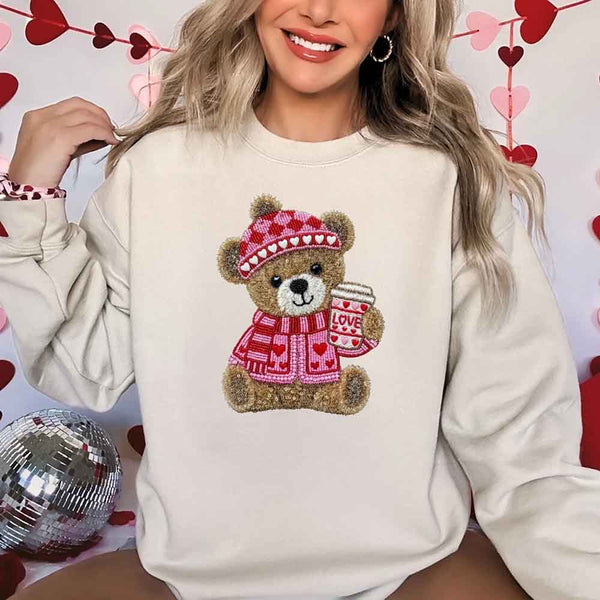 May include a crewneck sweatshirt with a Love Coffee Teddy Valentine design featuring a furry-look 3D printed effect.